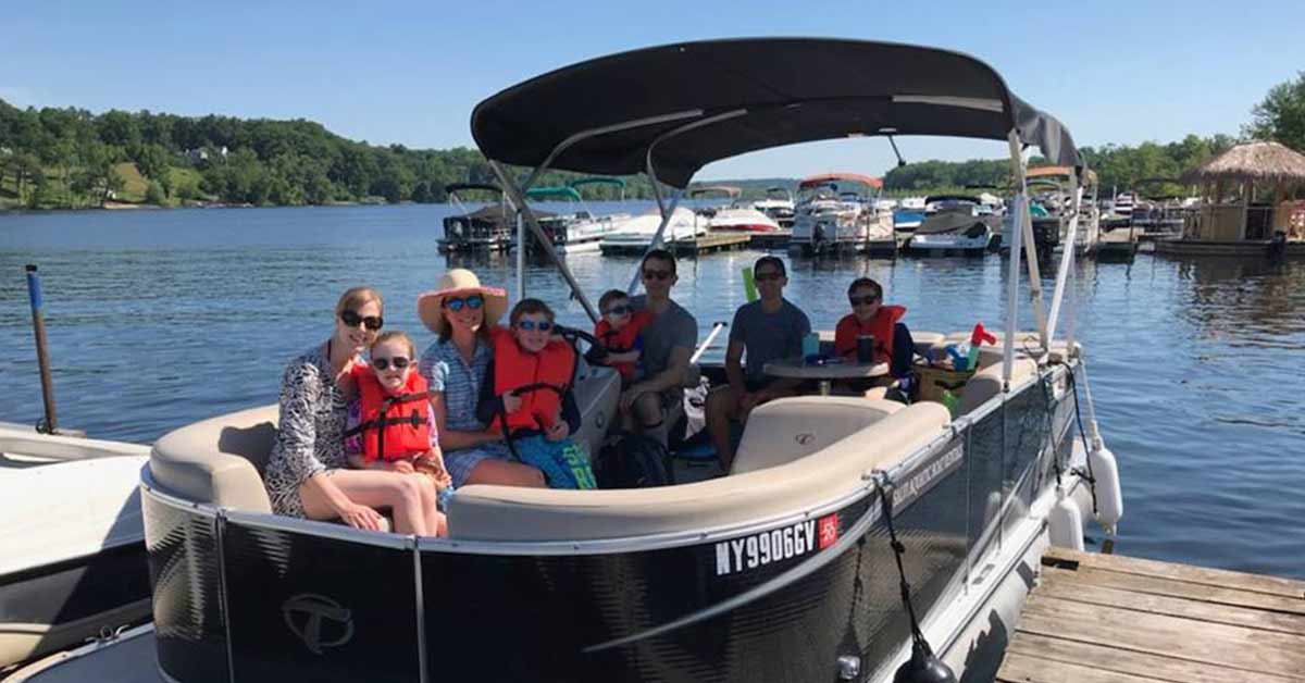 group of people in a motorboat