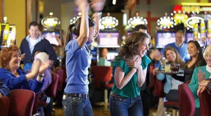 two young women super excited at the casino