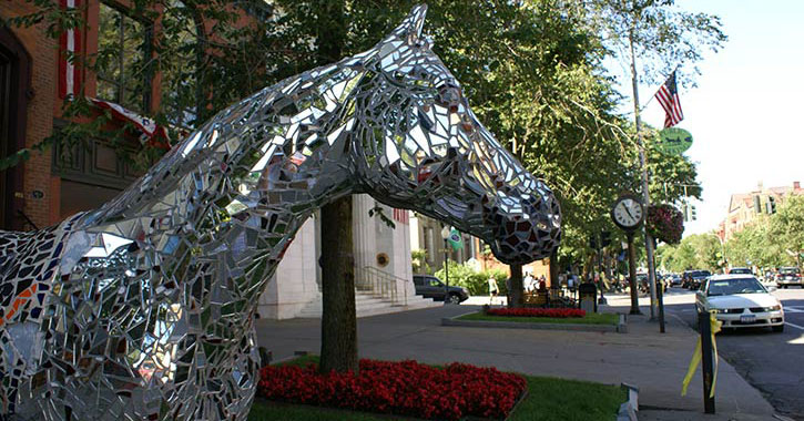 a silver statue of a horse