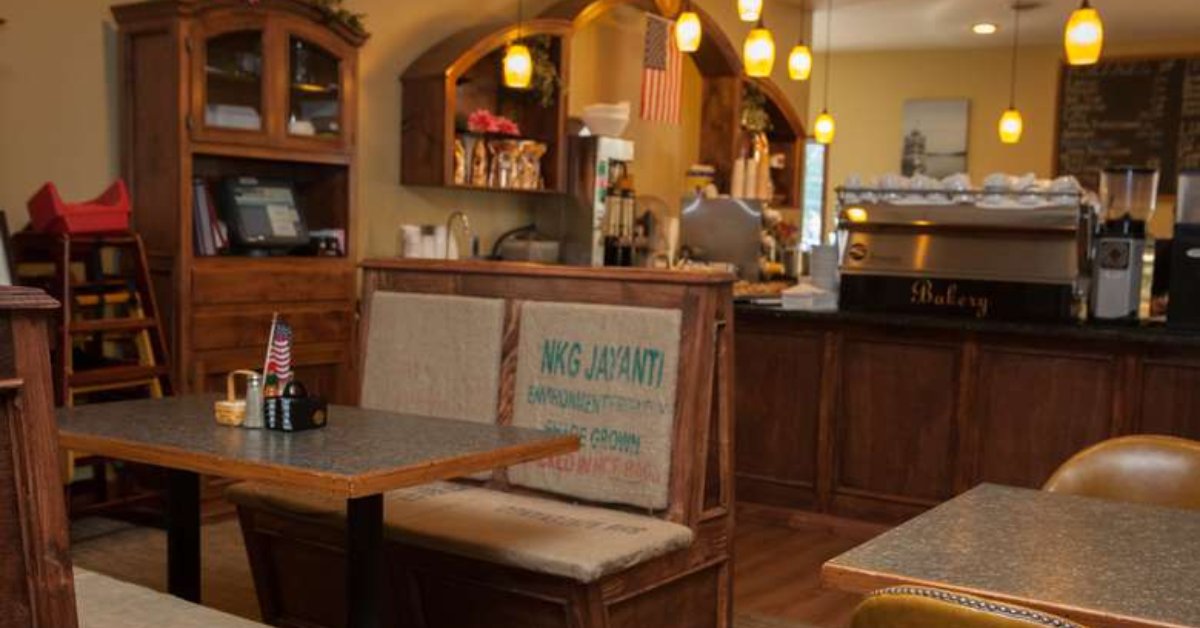 the interior of a coffee shop in morning light