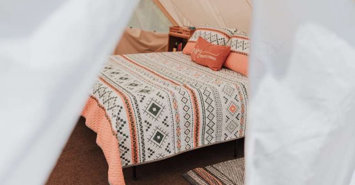 bed in a glamping tent