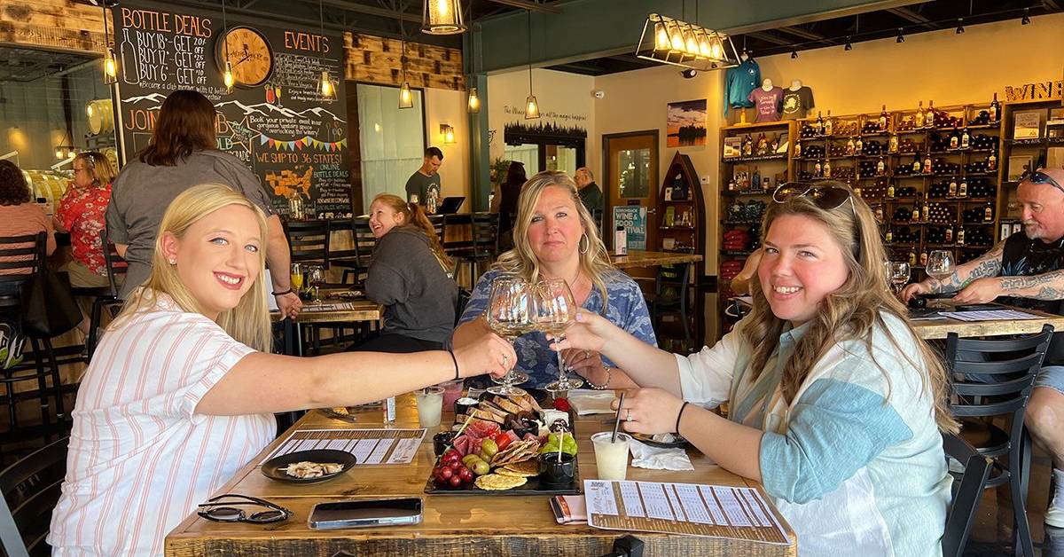 women cheers in restaurant