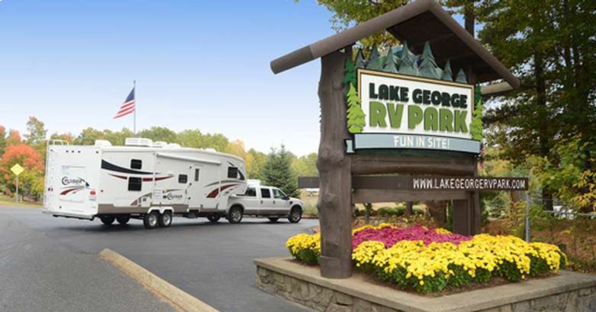 rv entering lake george rv park with sign in front