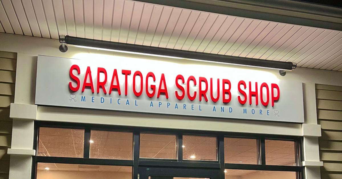 saratoga scrub shop sign over front door