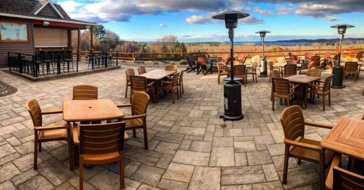 patio with tables against scenic backdrop