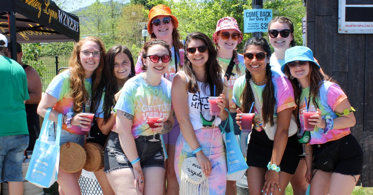 bachelorette group in tie dye shirts at festival