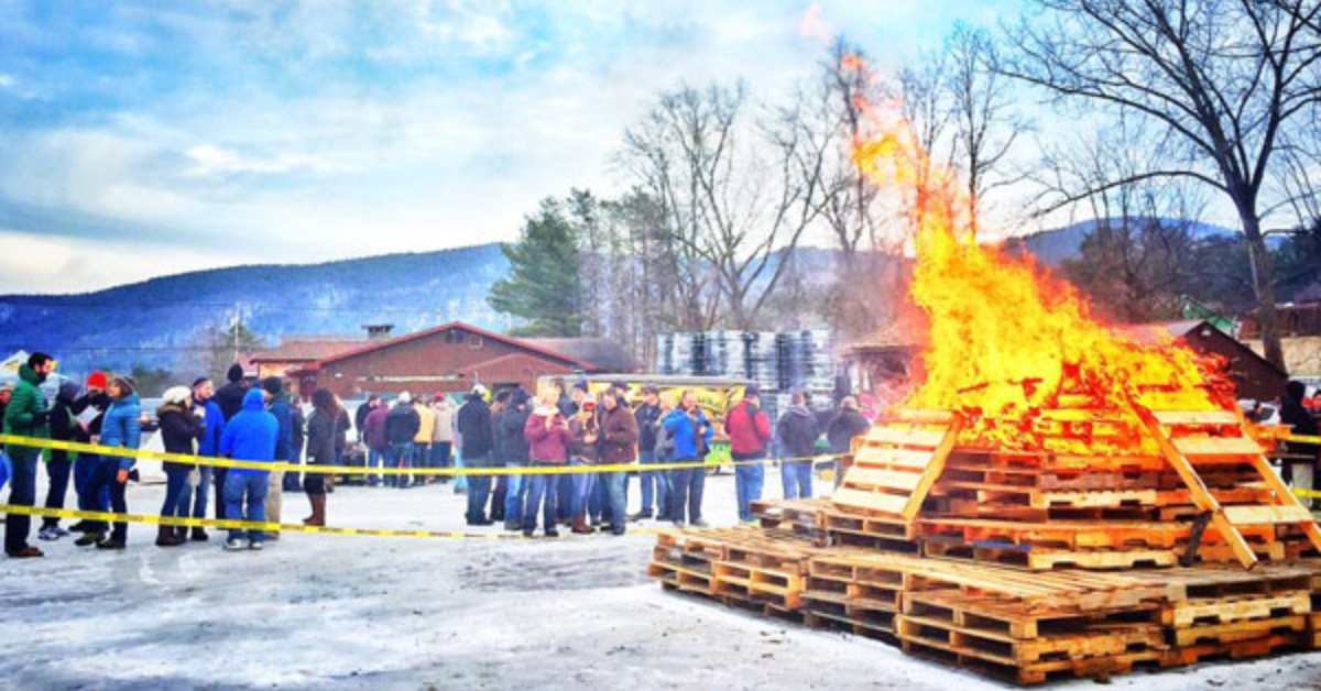 large wooden planks in a bonfire at a winter festival