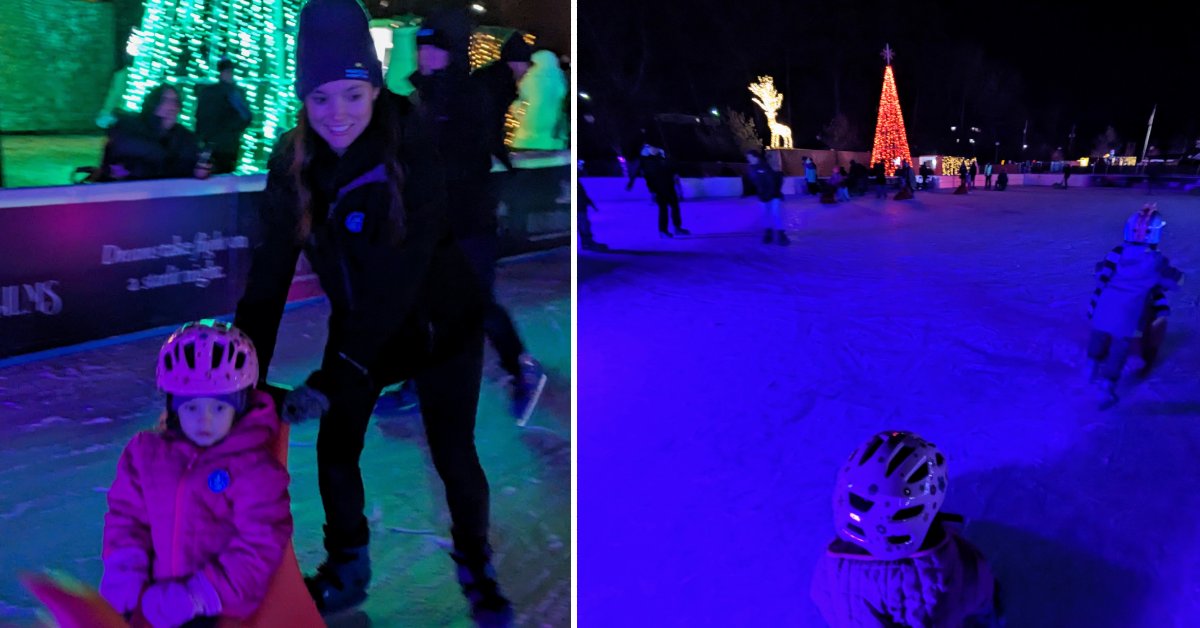 mom and daughter ice skate together on left, people on ice skating rink with lit up reindeer and tree in background