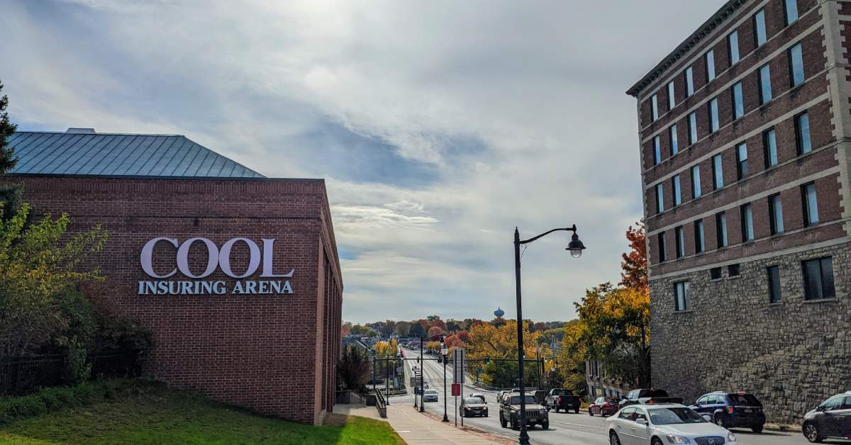 exterior of building and a busy street to the right of it