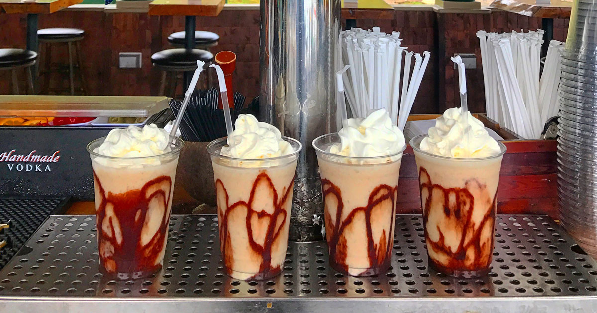 four desserts in cups