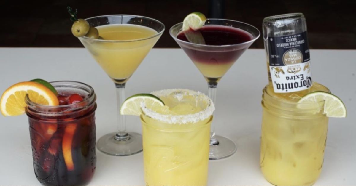 five cocktails on a table