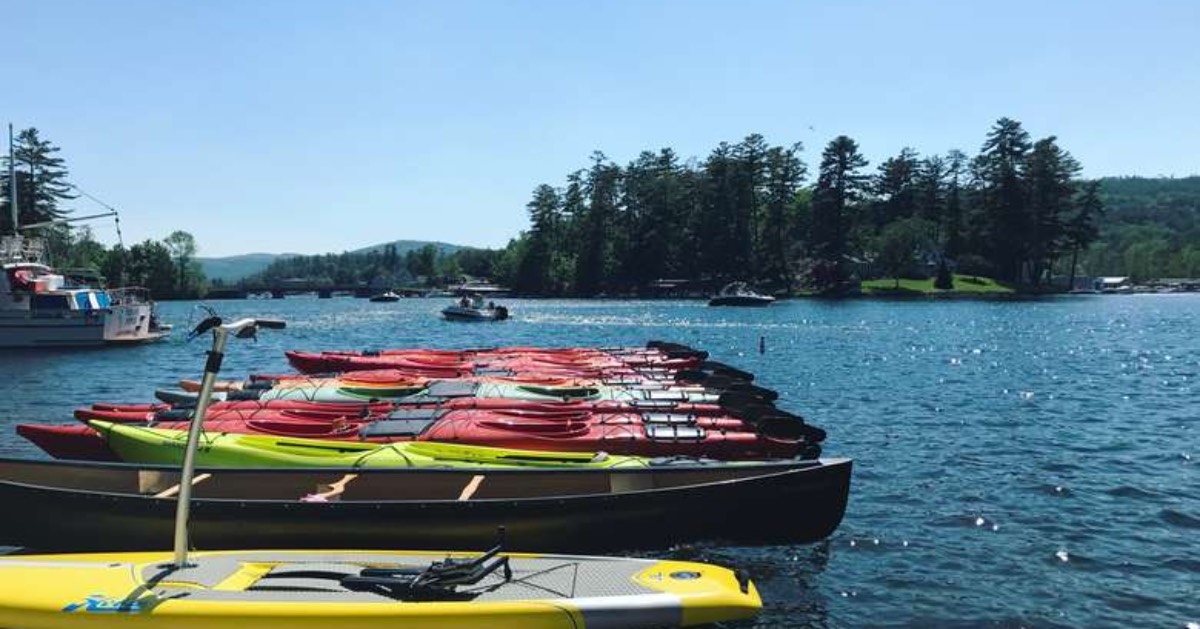 kayaks on a lake on a sunny day