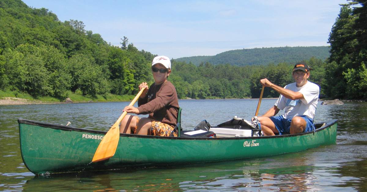 man and son in a canoe