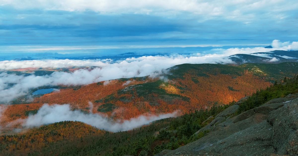 summit of a mountain with clouds