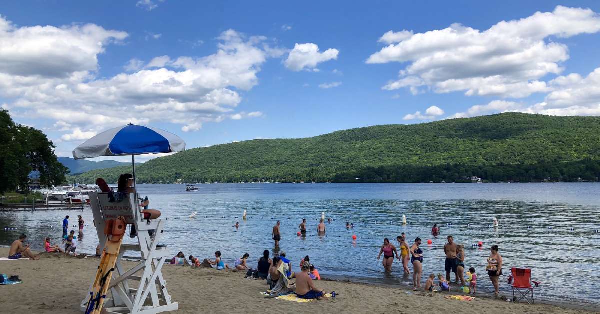 people swimming at shepards park beach