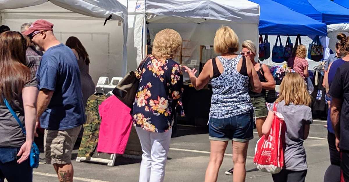 women shopping at a fair