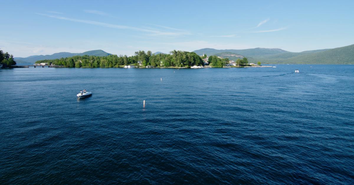 aerial view of a lake with boats on it