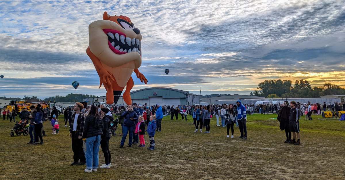 Tasmanian devil hot air balloon and crowd at festival 