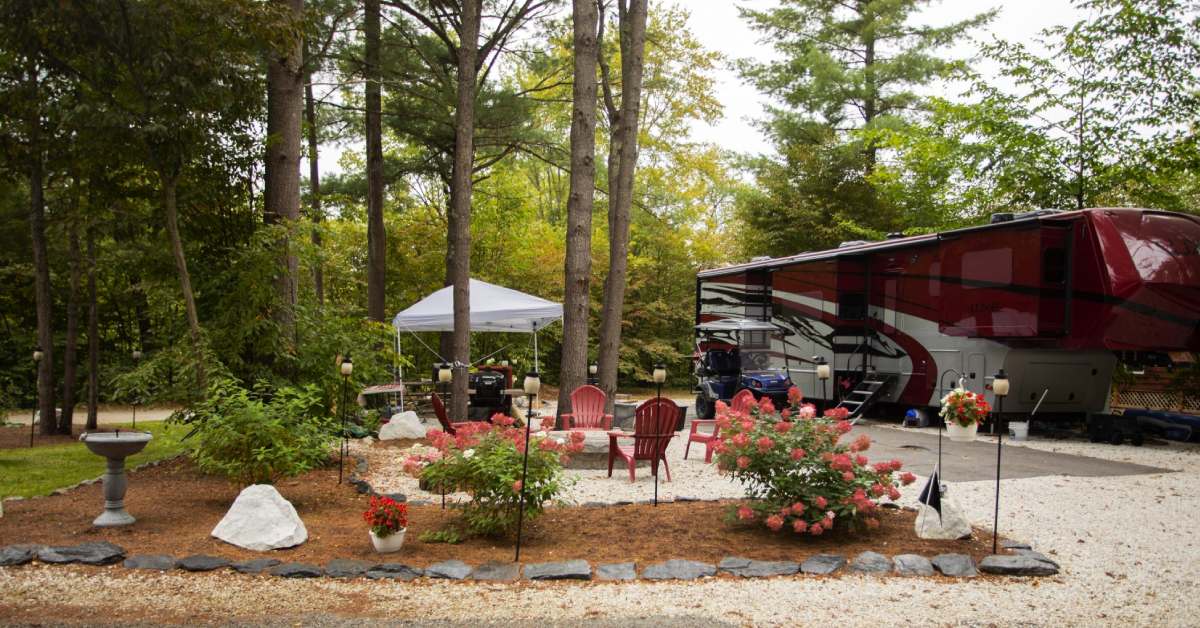 campsite with outdoor area with small garden and fire pit