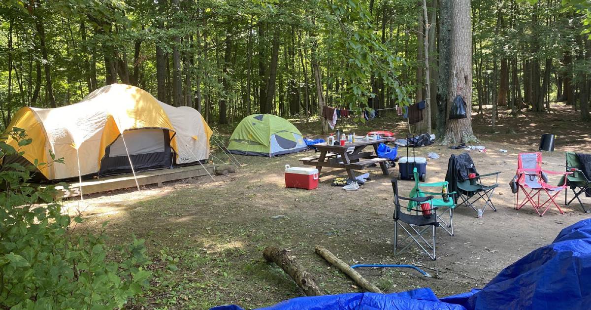 campsite with tents and supplies