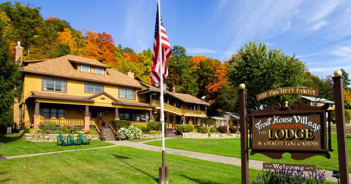 Trout House with sign in the fall