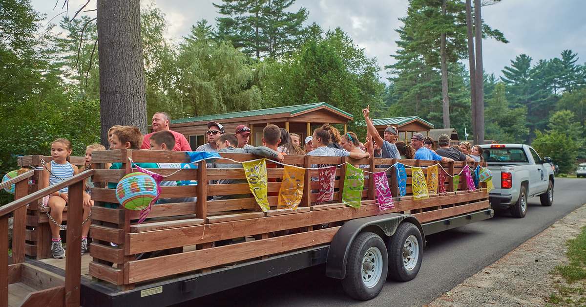 families taking a wagon ride