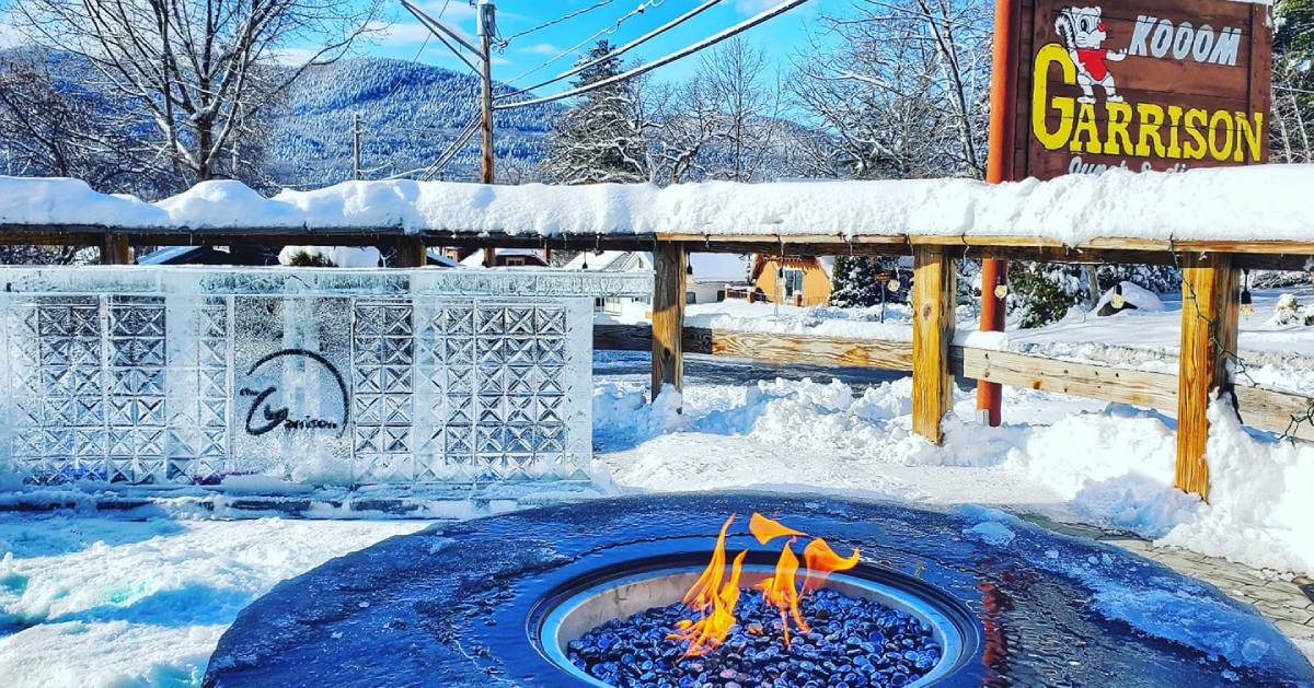 fire pit and ice bar on a snowy patio
