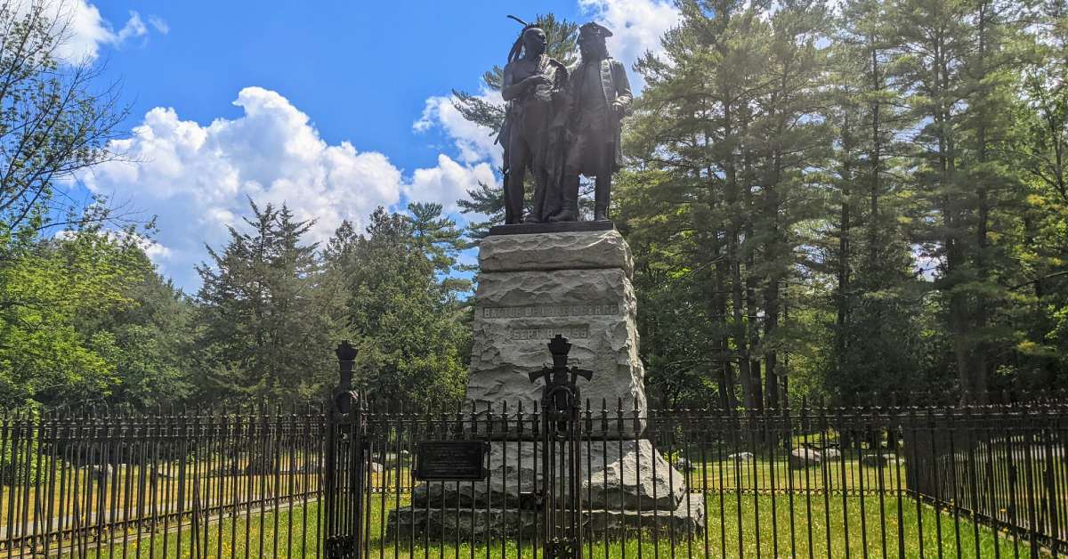 statue of mohawk chief and british general