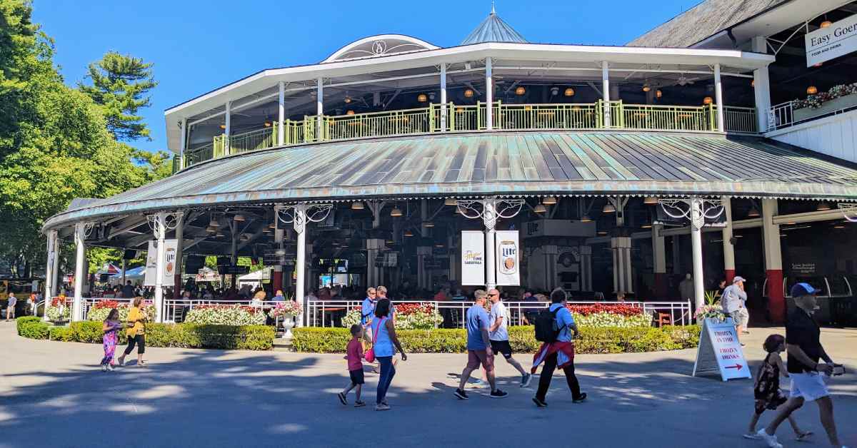 view of people walking around building at Saratoga Race Course