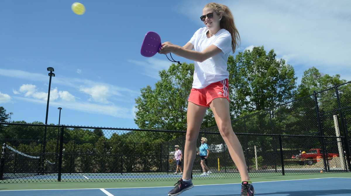 girl playing pickleball