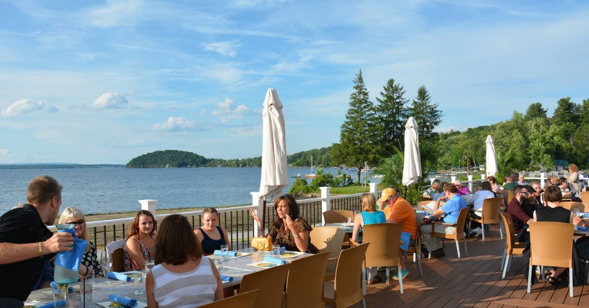 an outdoor patio with people dining