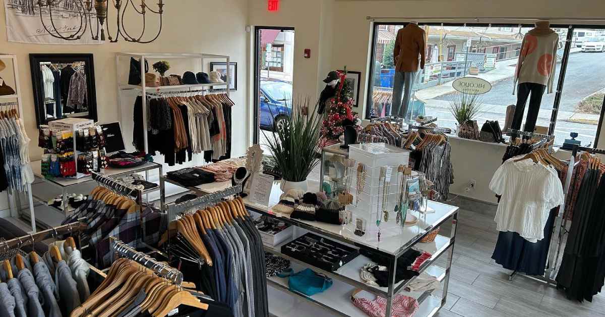 inside of a boutique with clothes and jewelry