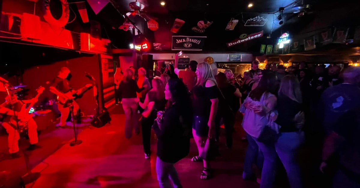 people dancing to live music