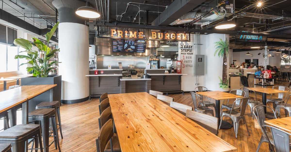 interior of food hall with tables and chairs set up