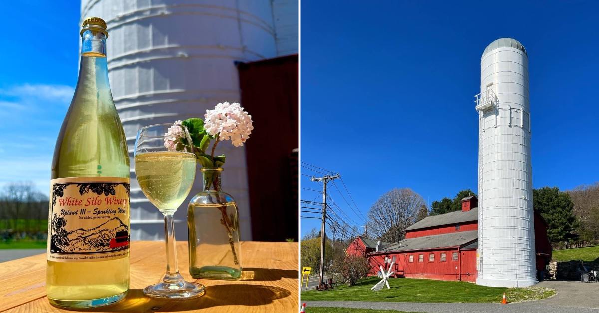 split image. on left is bottle of wine next to a glass of white wine. on right is exterior of a red building with a large white silo next to it