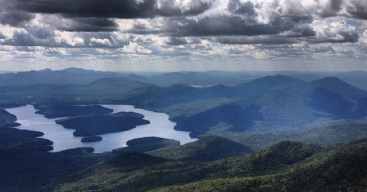 view of lakes and mountains from the top of a mountain