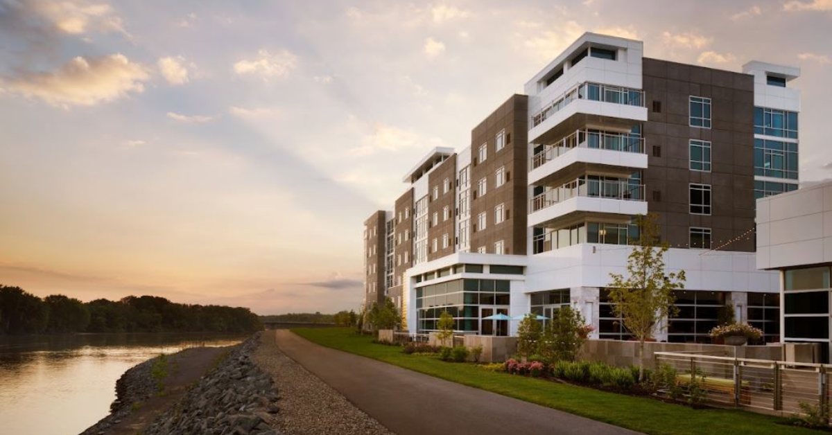 exterior of a hotel at sunset