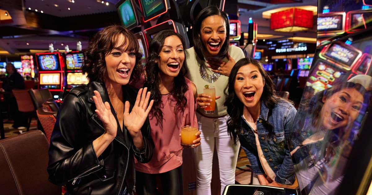 four women playing slots