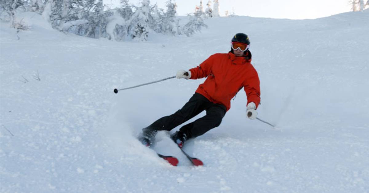 skier with red jacket on
