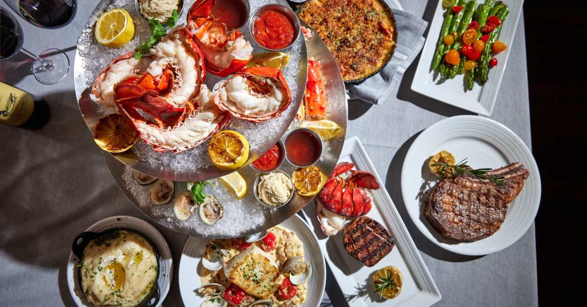 table with a bunch of seafood on it