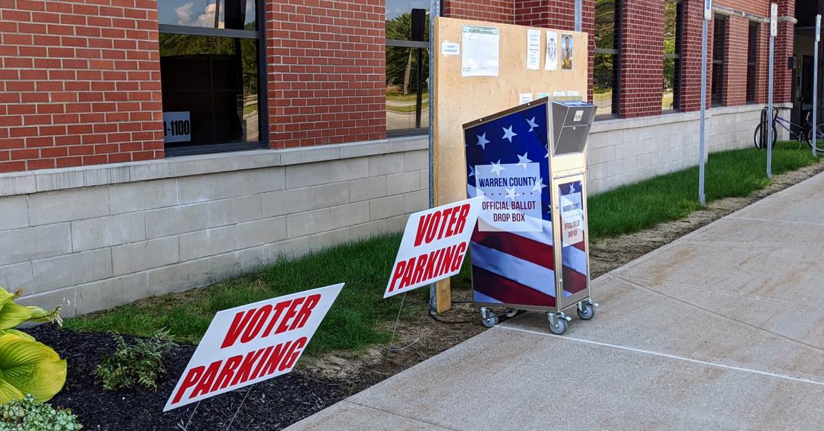 warren county ballot box outside building with voter parking signs