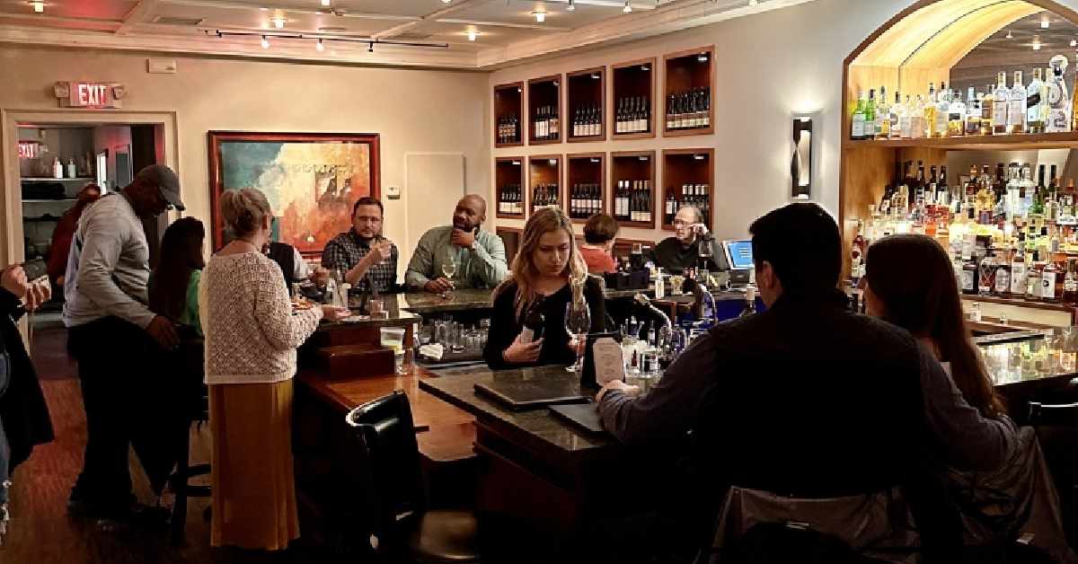patrons enjoying wine at the Saratoga wine bar