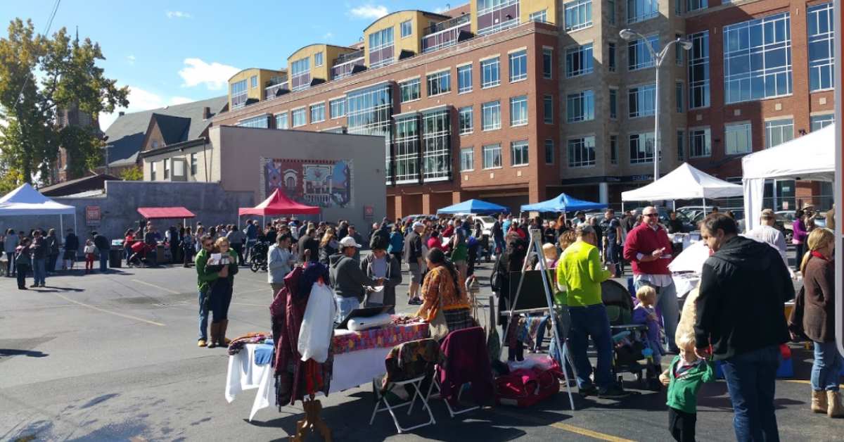 crowd of people in a parking lot for an event