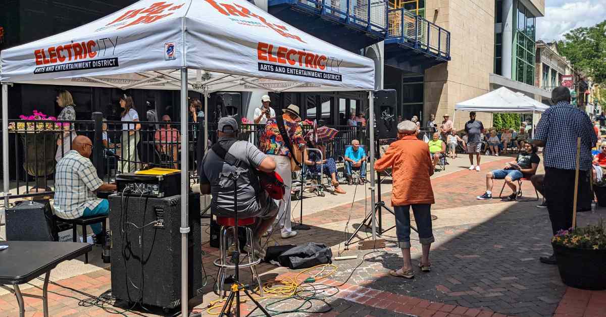 band performing outdoors on pedestrian street