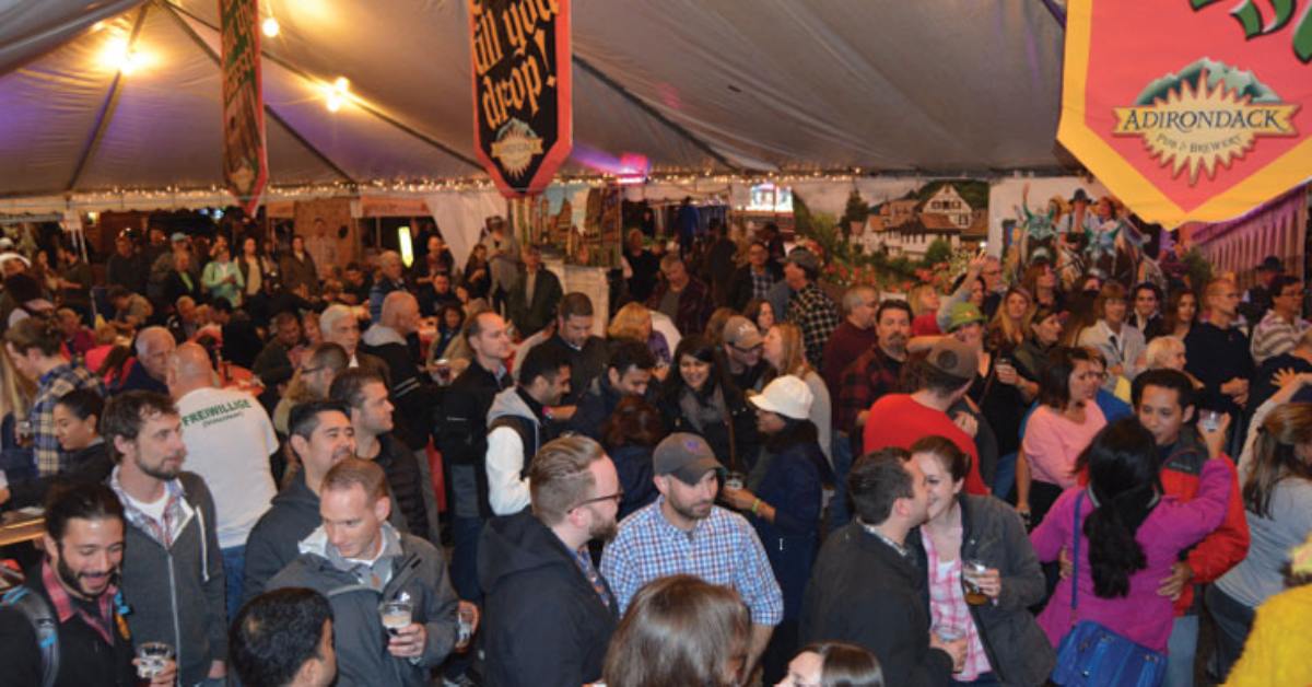 a crowded tent full with people