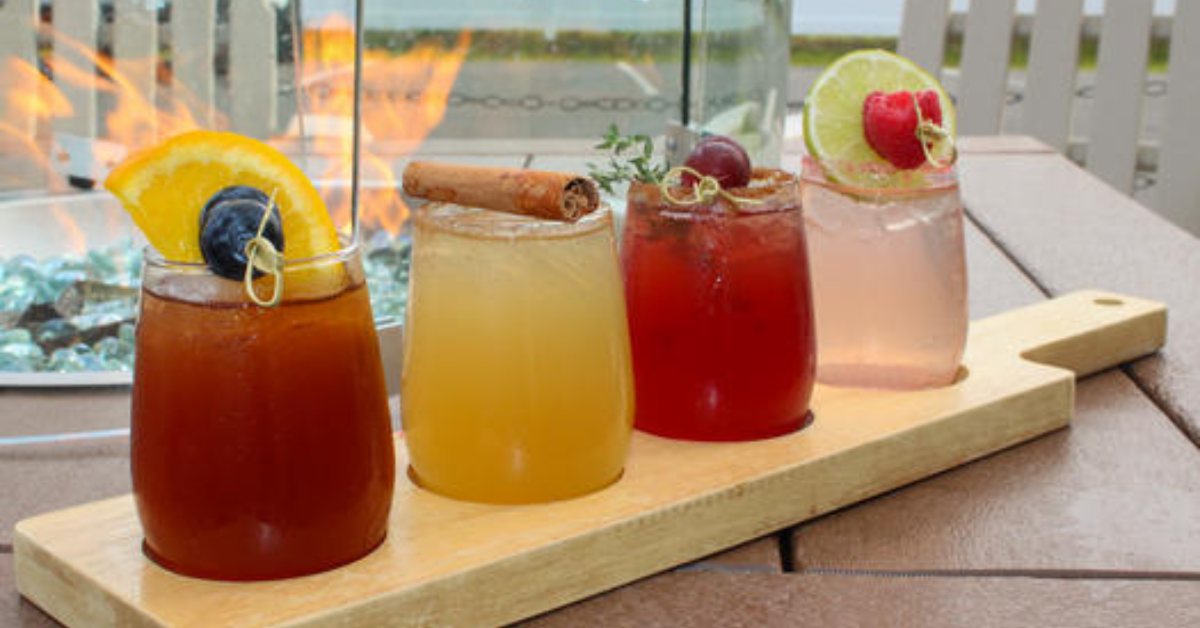 row of four fall cocktails