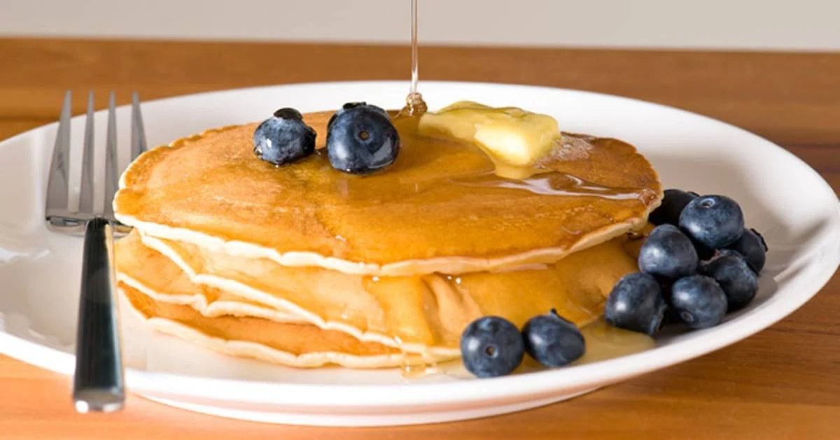 plate with pancakes and blueberries on it