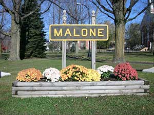Malone sign with Flowers
