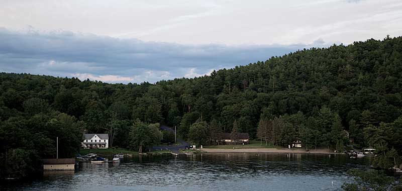 Houses and trees on the shore of Lake George's Gull Bay in Putnam NY