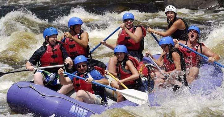 splashing in a whitewater rafting trip